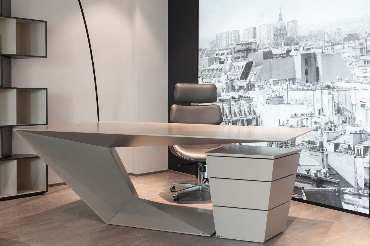 The Art of Drawing Readers In: Your attractive post title goes here Interior of contemporary office with comfortable chair and futuristic table near cupboard against wall with printed wallpaper
